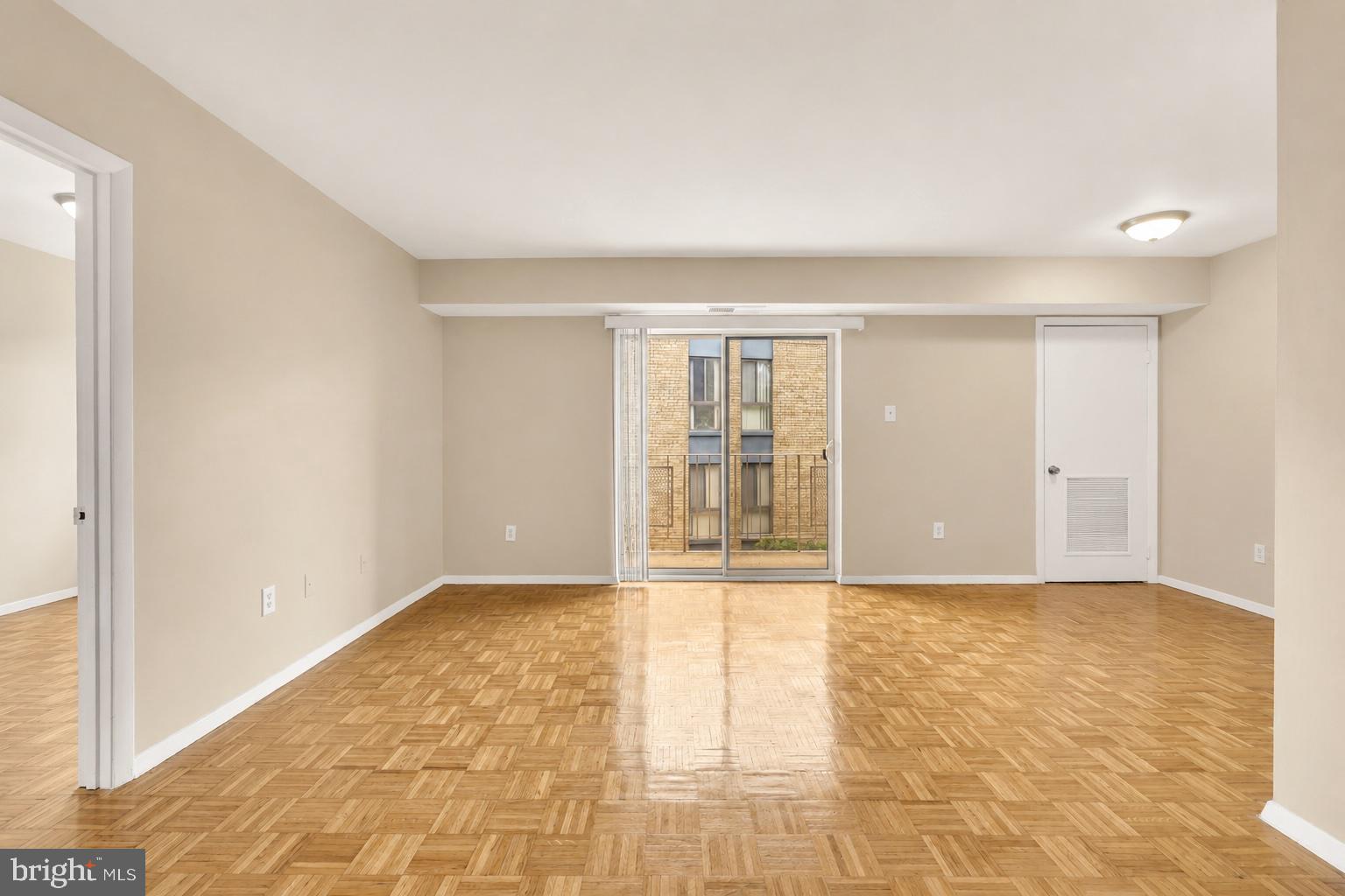 7056 Eastern Avenue Northwest, Unit 107 Washington, DC 20012 - Photo 7 of 36 Large living room area!