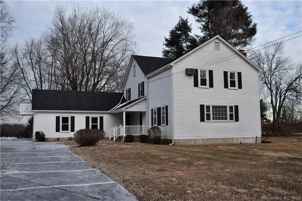 a view of a yard in front of a house