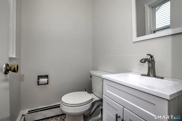 a bathroom with a sink and a toilet