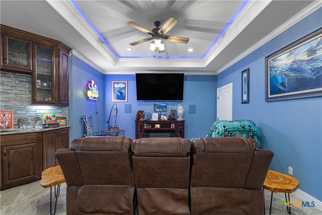 254 Sendera Loop Victoria, TX 77904 - Photo 25 of 48 a living room with furniture and a flat screen tv