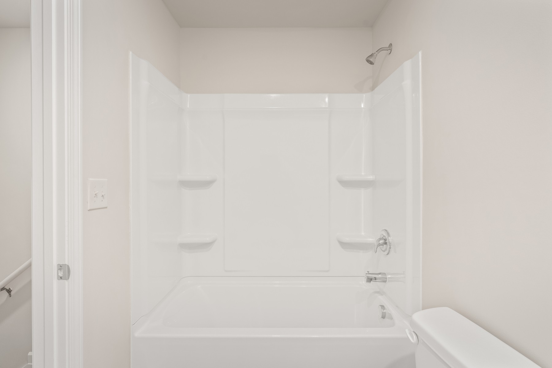 2036 Lala Loop White Bluff, TN 37187 - Photo 12 of 12 a bathroom with a bathtub and a toilet