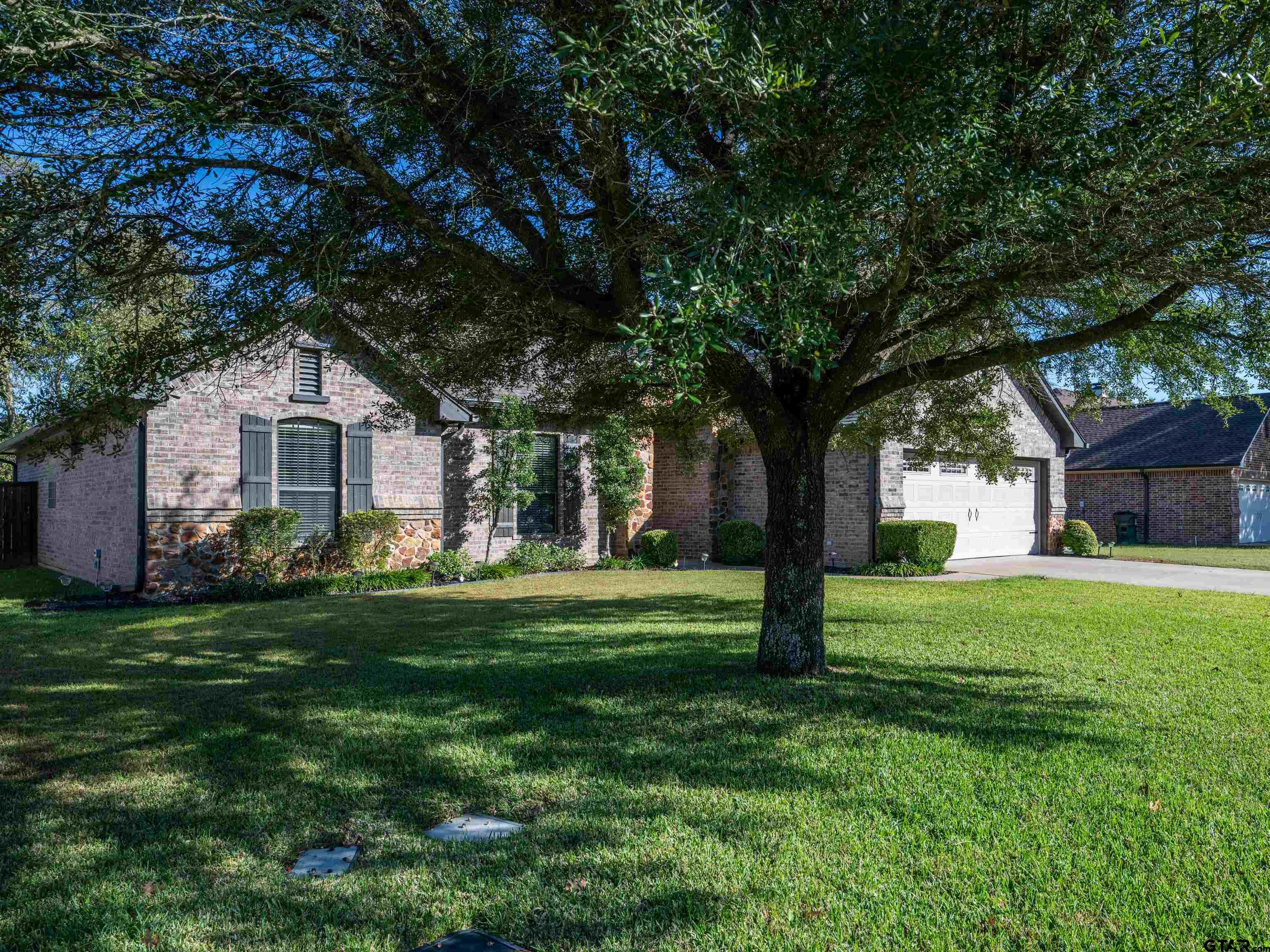 19560 Sandhill Lane Flint, TX 75762 - Photo 3 of 35 a front view of a house with a yard