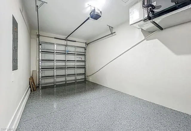 a view of empty room with windows