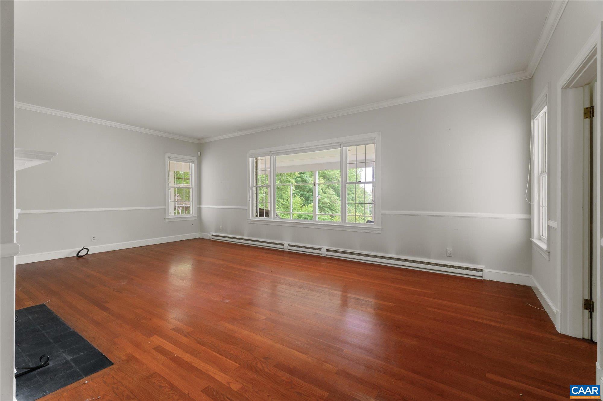 13320 Hackberry Road Orange, VA 22960 - Photo 6 of 47 an empty room with wooden floor and windows