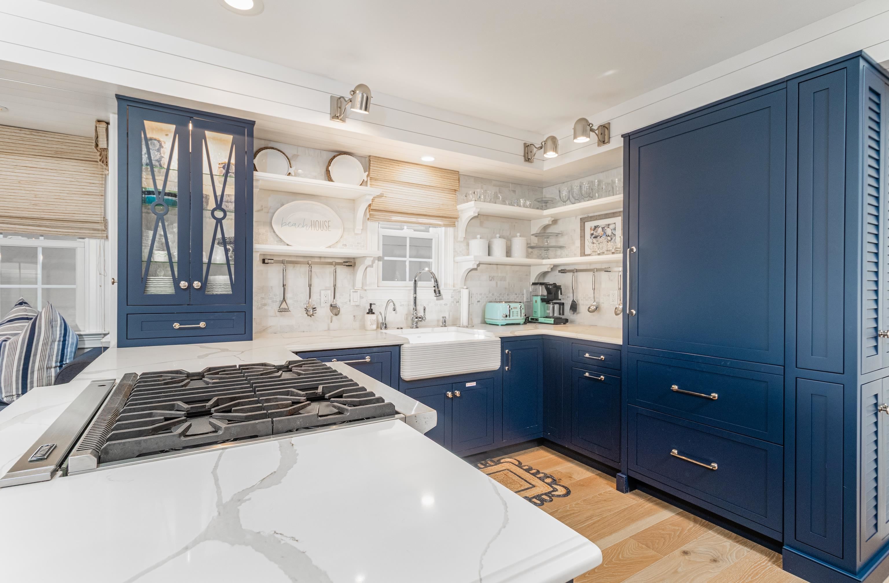 328 83rd Street Stone Harbor, NJ 08247 - Photo 13 of 34 a kitchen with a stove a sink and a refrigerator