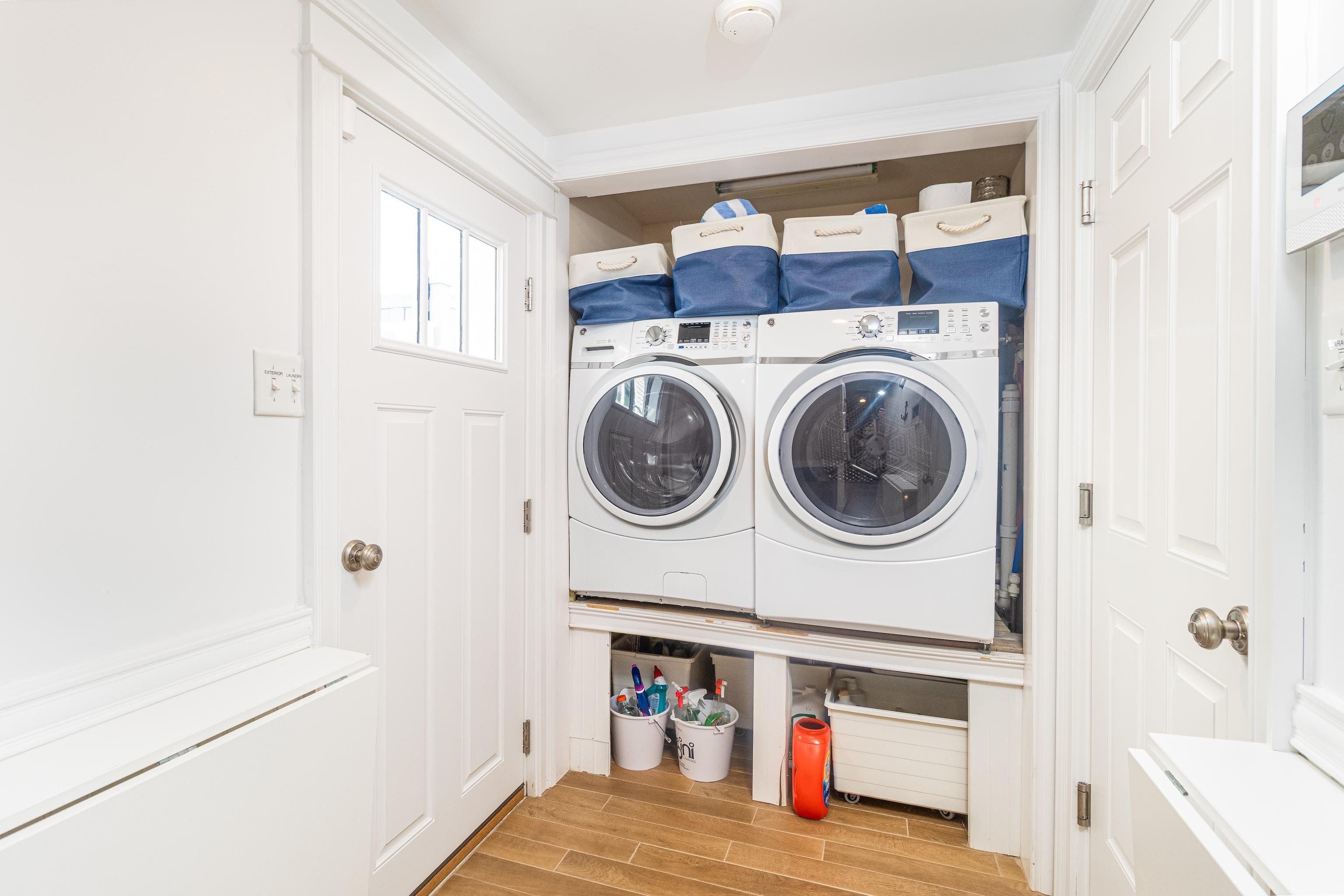 328 83rd Street Stone Harbor, NJ 08247 - Photo 26 of 34 a view of washer and dryer with kitchen in the background