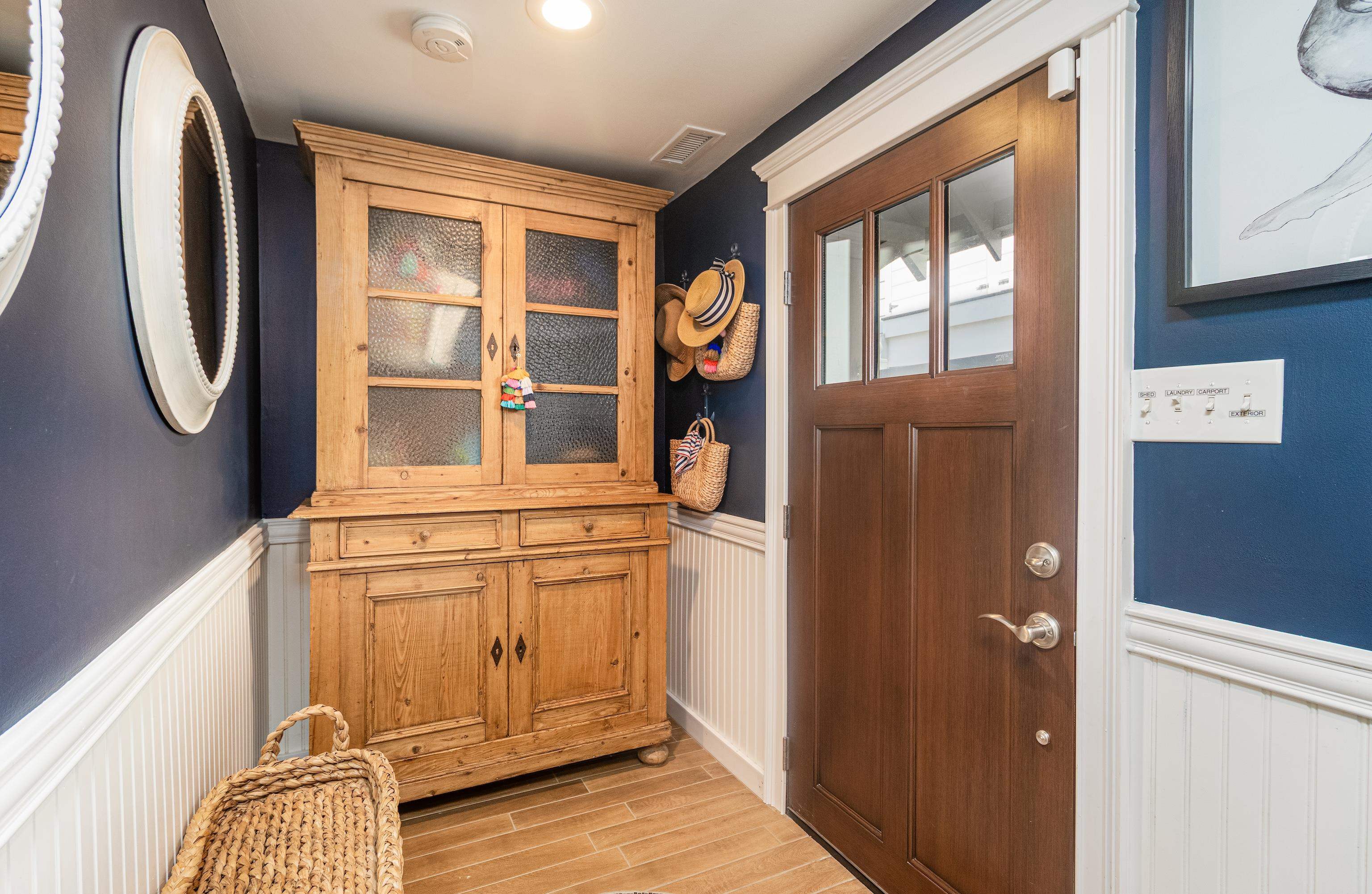 328 83rd Street Stone Harbor, NJ 08247 - Photo 8 of 34 a view of an entryway with wooden floor and door