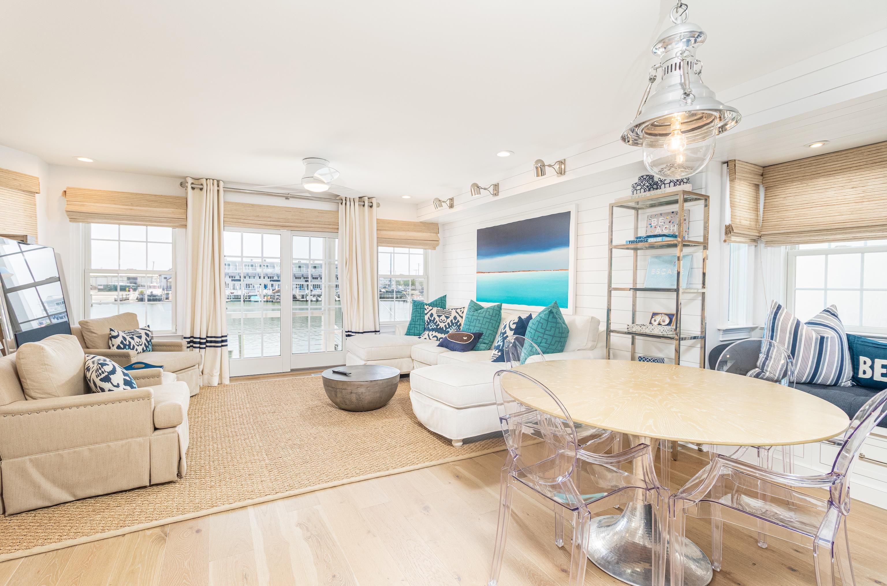 328 83rd Street Stone Harbor, NJ 08247 - Photo 9 of 34 a living room with furniture and a large window