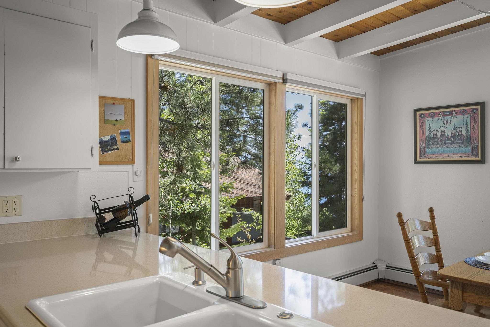 20 Observation Drive Tahoe City, CA 96145 - Photo 11 of 28 a view of a dining room with furniture window and outside view