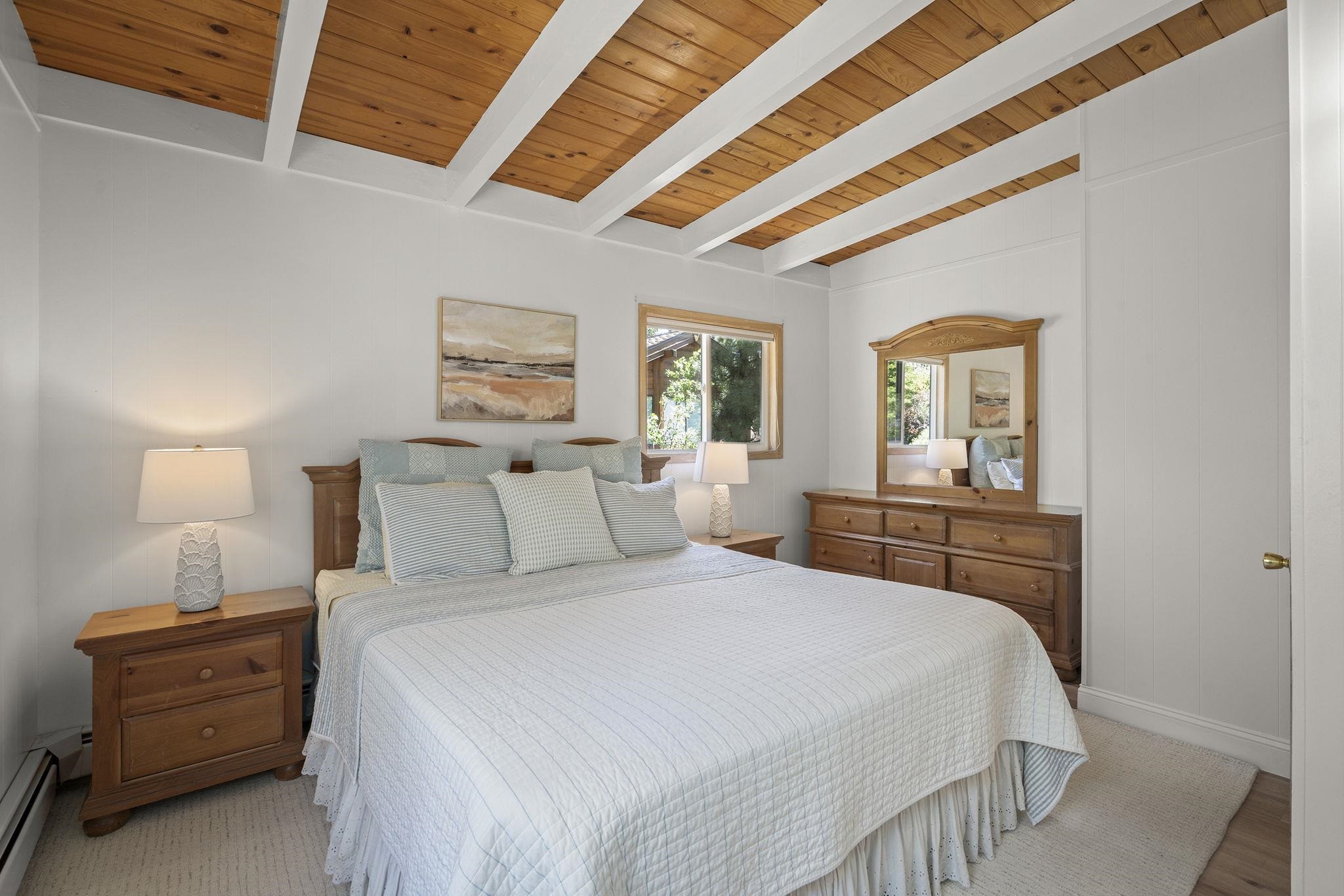 20 Observation Drive Tahoe City, CA 96145 - Photo 12 of 28 a bedroom with a bed and a dresser