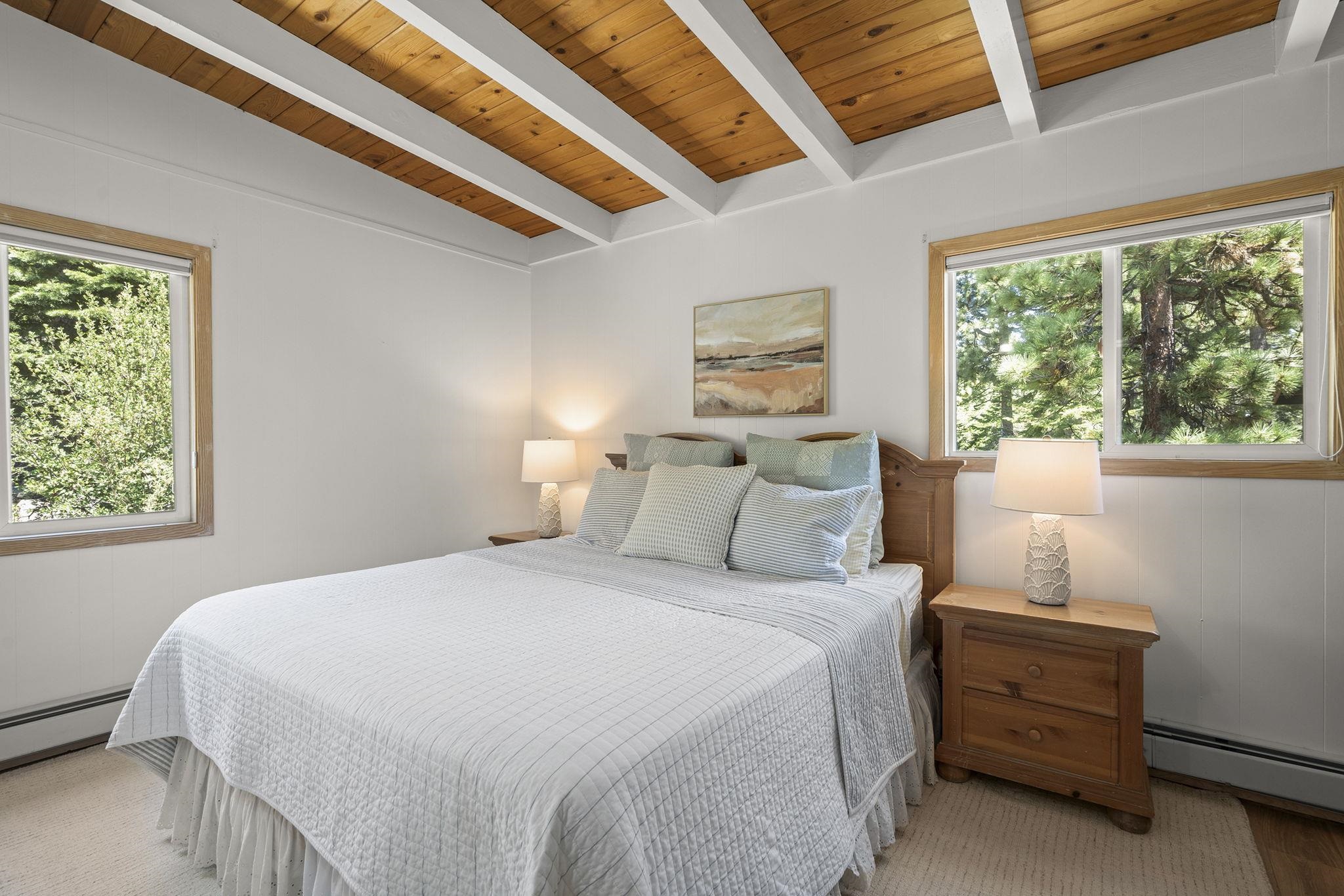 20 Observation Drive Tahoe City, CA 96145 - Photo 13 of 28 a bedroom with a bed and a window