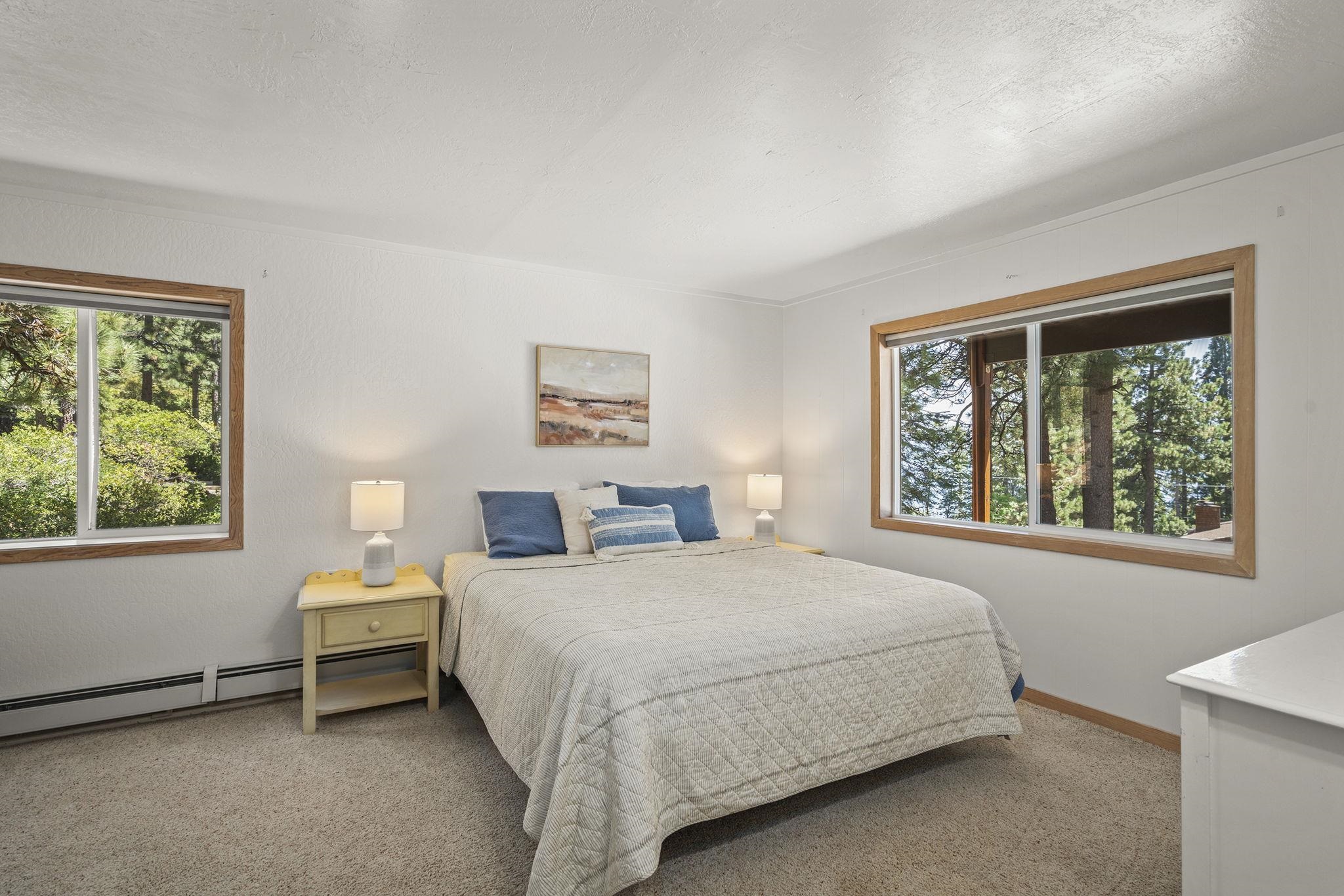 20 Observation Drive Tahoe City, CA 96145 - Photo 20 of 28 a bedroom with a bed and a window