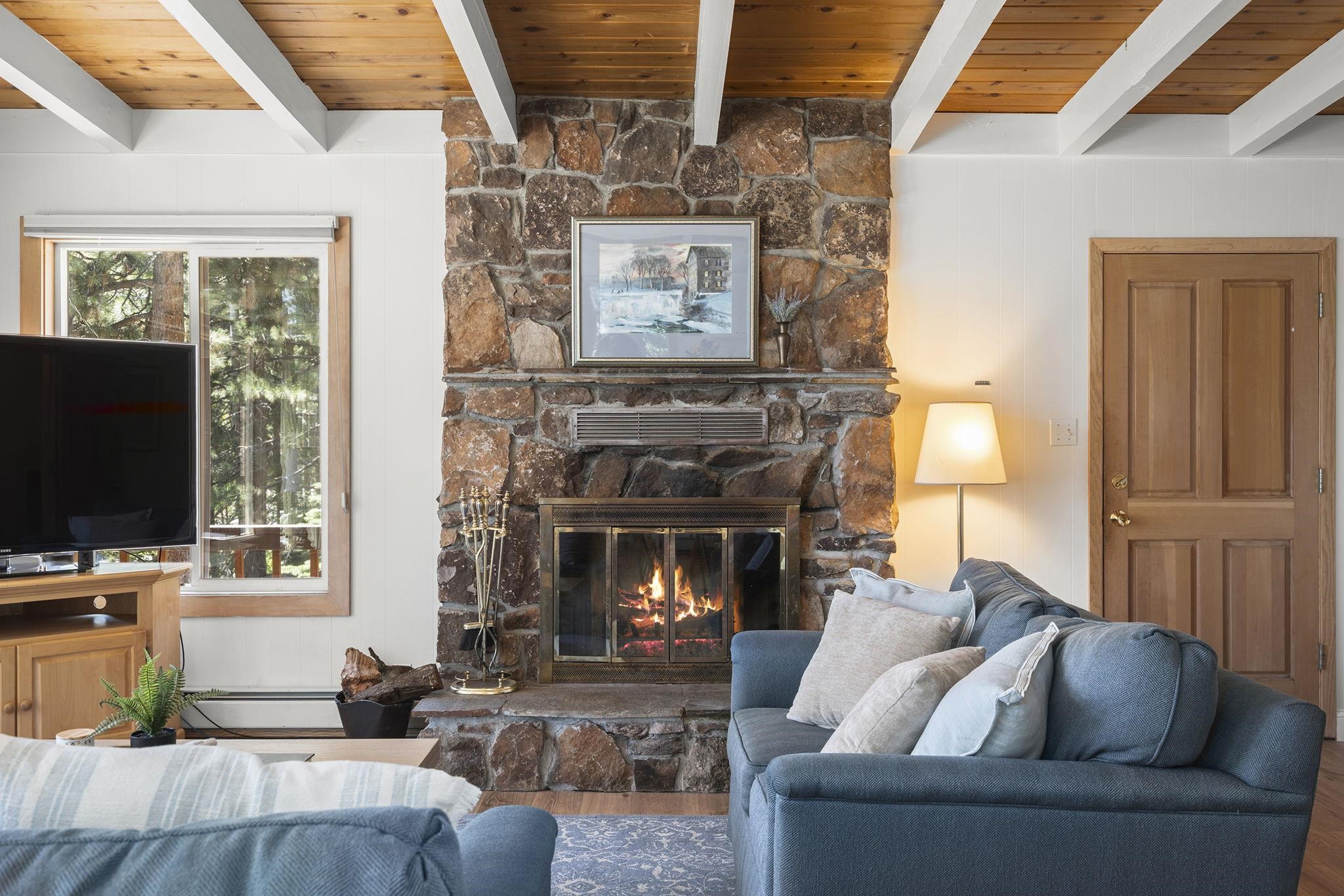 20 Observation Drive Tahoe City, CA 96145 - Photo 4 of 28 a living room with furniture and a fireplace