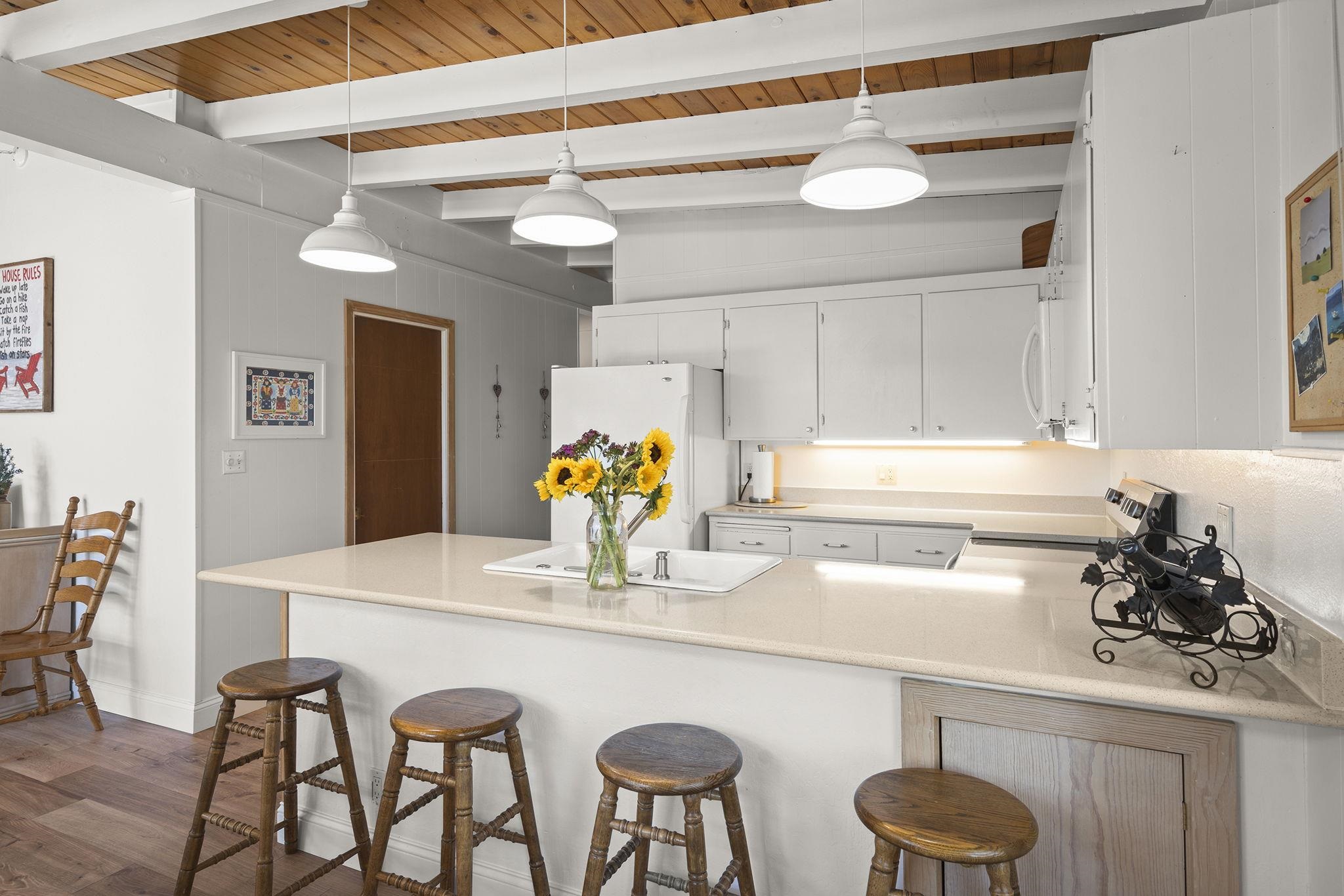 20 Observation Drive Tahoe City, CA 96145 - Photo 10 of 28 a kitchen with furniture and a table