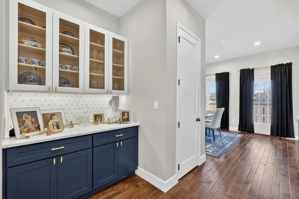 a kitchen with a sink stove and refrigerator