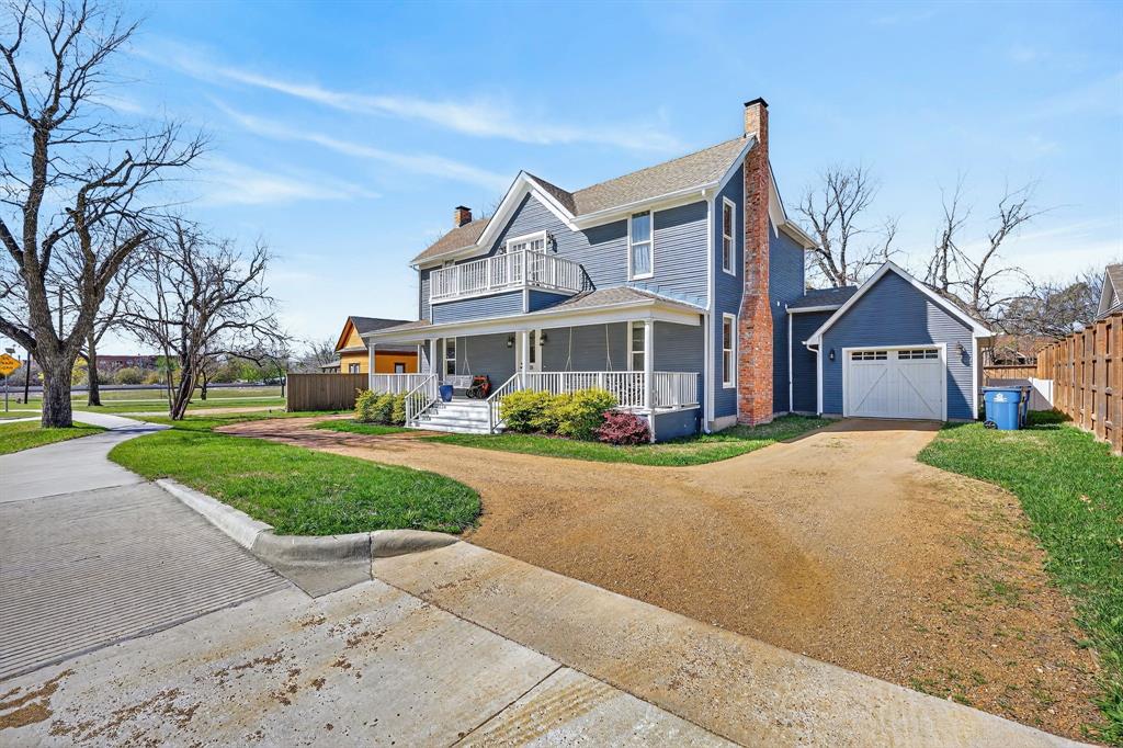608 South Dooley Street Grapevine, TX 76051 - Photo 2 of 38 a front view of house with yard and green space