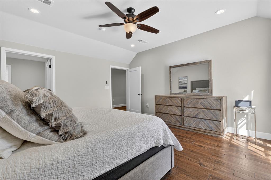 608 South Dooley Street Grapevine, TX 76051 - Photo 27 of 38 a bedroom with a bed and a dresser