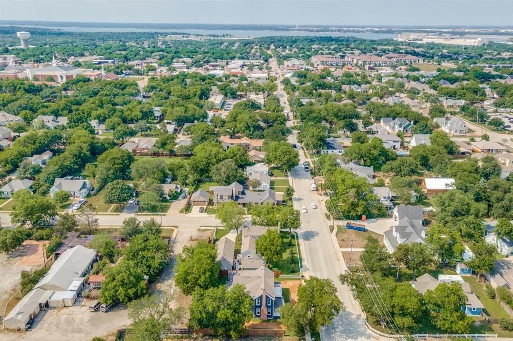 608 South Dooley Street Grapevine, TX 76051 - Photo 3 of 38 an aerial view of residential houses with outdoor space and trees