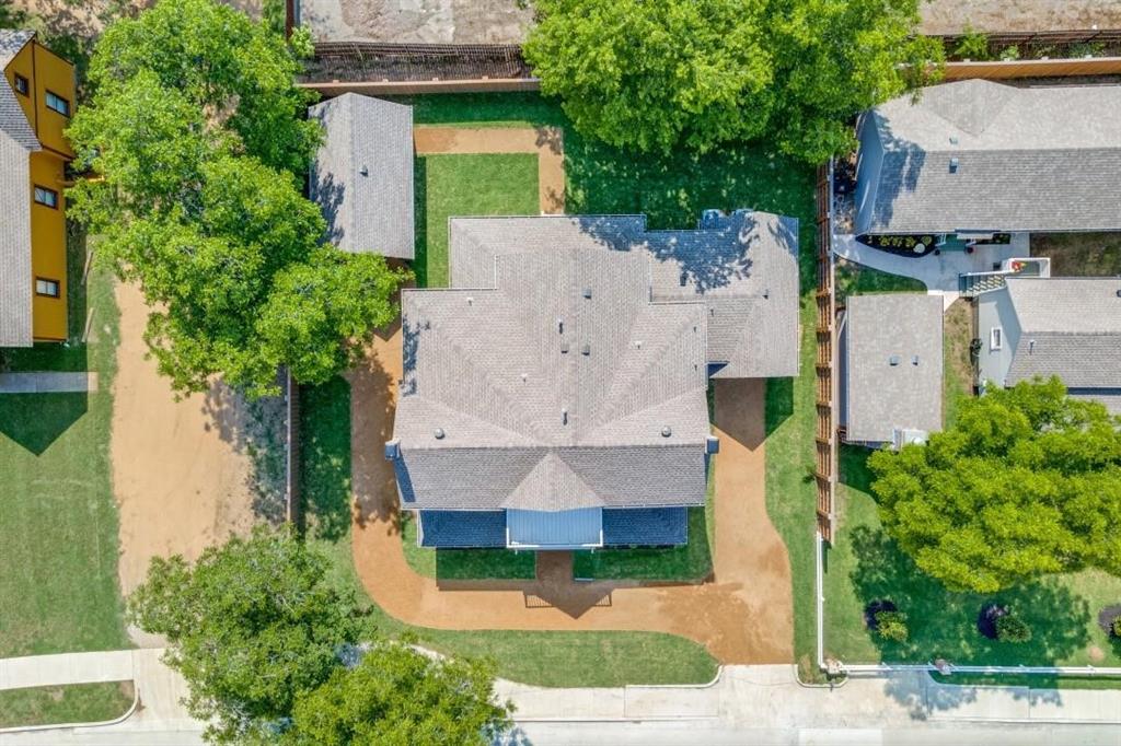 608 South Dooley Street Grapevine, TX 76051 - Photo 35 of 38 an aerial view of residential houses with outdoor space and trees
