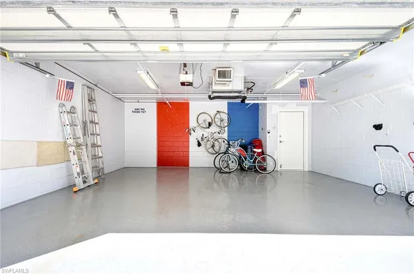 a living room with lots of furniture and a chandelier