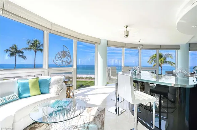 a kitchen with a table and chairs