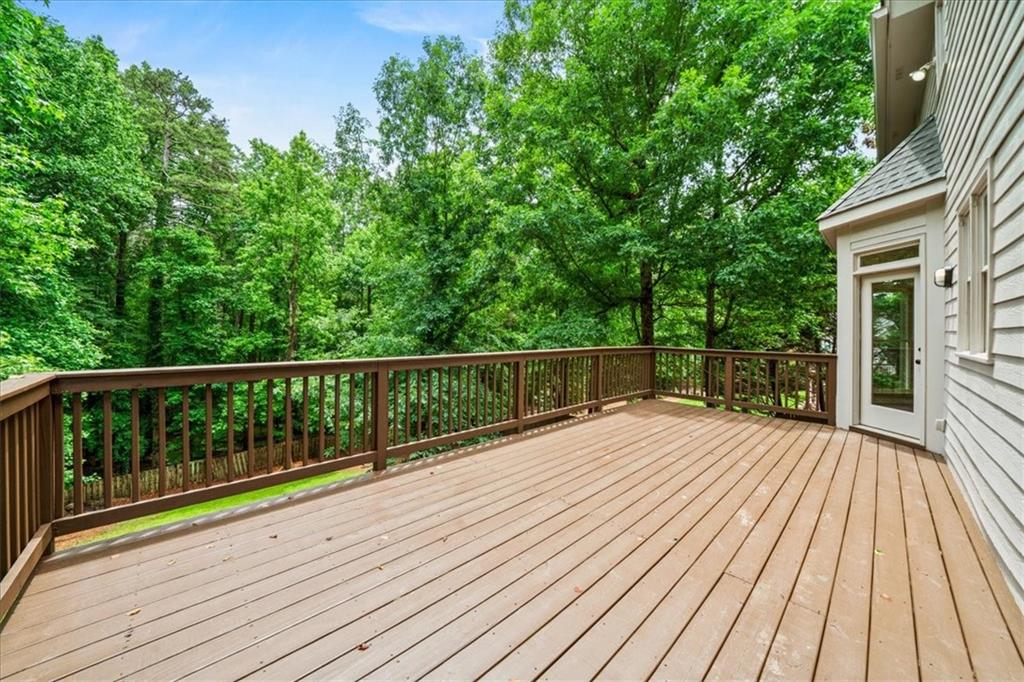1710 Rising Mist Lane Cumming, GA 30041 - Photo 4 of 111 a view of backyard with a deck and wooden floor