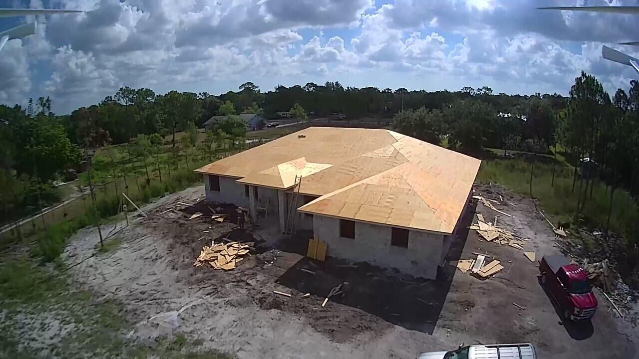 16630 132nd Terrace North Jupiter, FL 33478 - Photo 3 of 23 an aerial view of a house