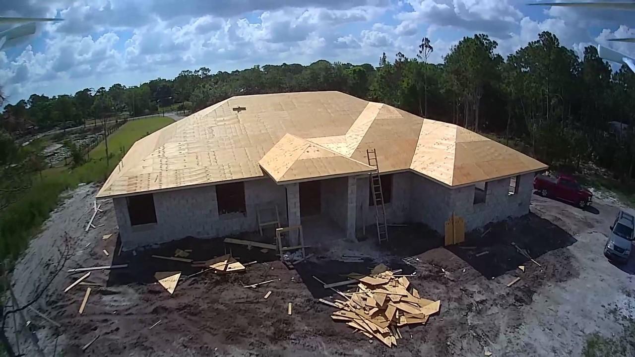 16630 132nd Terrace North Jupiter, FL 33478 - Photo 5 of 23 an aerial view of a house with a yard and mountain view in back