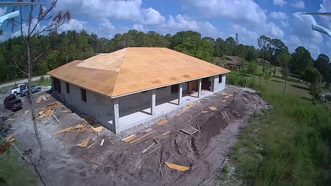 16630 132nd Terrace North Jupiter, FL 33478 - Photo 6 of 23 a view of a house with a yard patio and sitting area