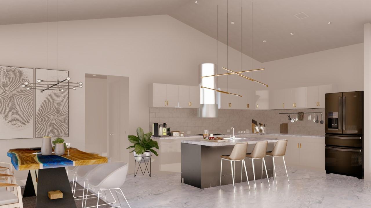 16630 132nd Terrace North Jupiter, FL 33478 - Photo 7 of 23 a kitchen with a dining table chairs and refrigerator