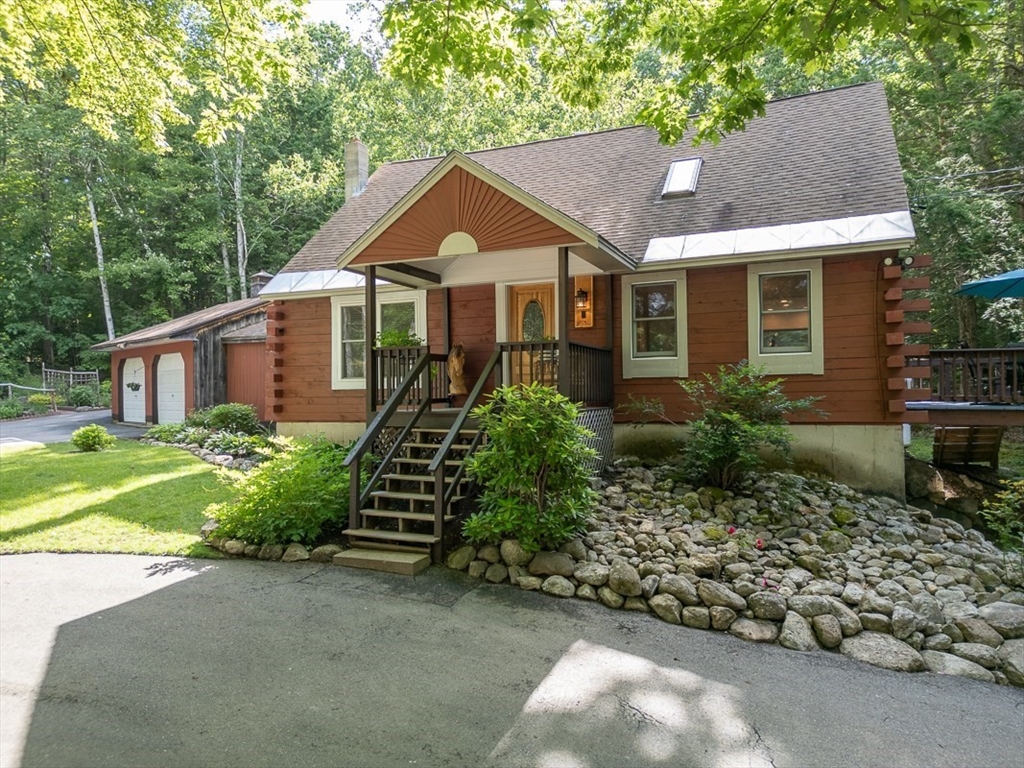 249 Pillsbury Road Ashby, MA 01431 - Photo 1 of 39 a front view of a house with a yard