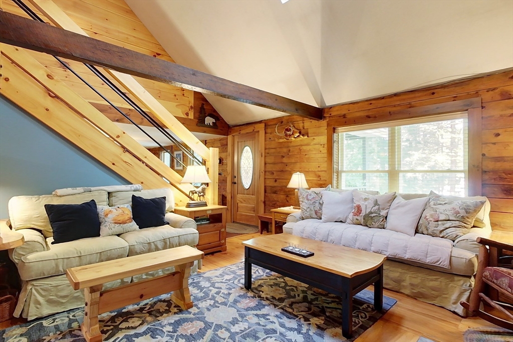 249 Pillsbury Road Ashby, MA 01431 - Photo 12 of 39 a living room with furniture and a large window