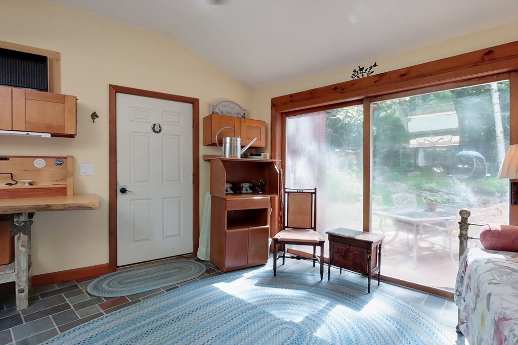 249 Pillsbury Road Ashby, MA 01431 - Photo 16 of 39 a living room with furniture and a wooden floor