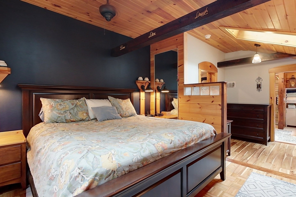 249 Pillsbury Road Ashby, MA 01431 - Photo 20 of 39 a bedroom with bed and wooden floor