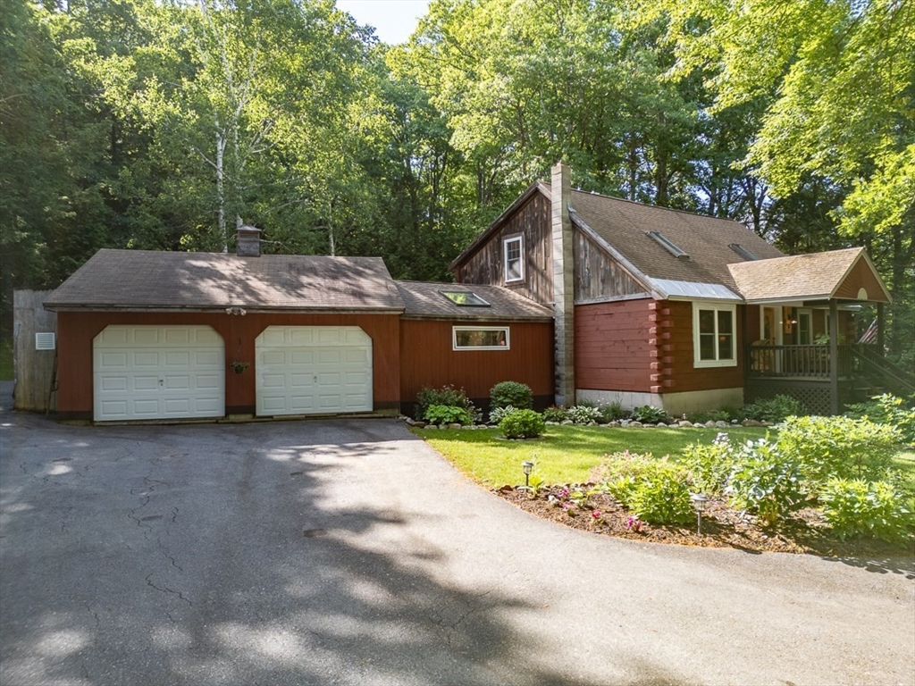 249 Pillsbury Road Ashby, MA 01431 - Photo 28 of 39 a house with a yard