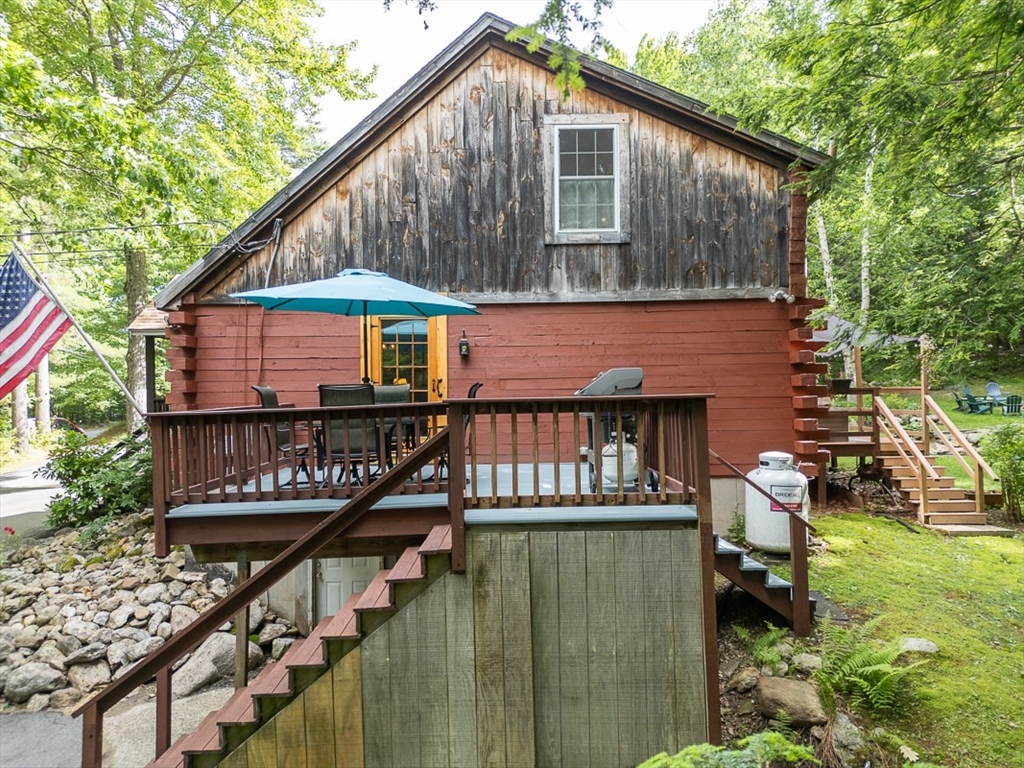 249 Pillsbury Road Ashby, MA 01431 - Photo 29 of 39 a front view of a house with balcony and wooden floor