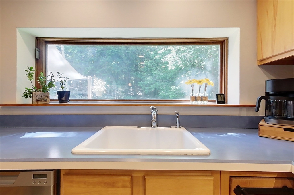 249 Pillsbury Road Ashby, MA 01431 - Photo 3 of 39 a bathroom with a large window and a sink