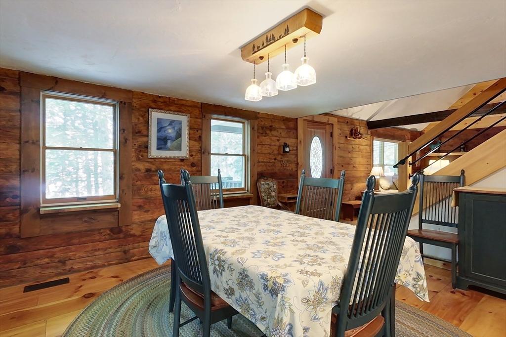 249 Pillsbury Road Ashby, MA 01431 - Photo 9 of 39 a view of a dining room with furniture window and wooden floor