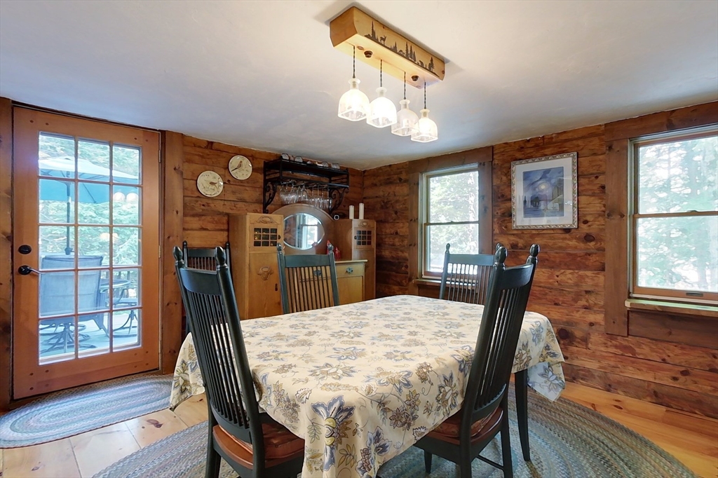 249 Pillsbury Road Ashby, MA 01431 - Photo 10 of 39 a view of a dining room with furniture window and wooden floor