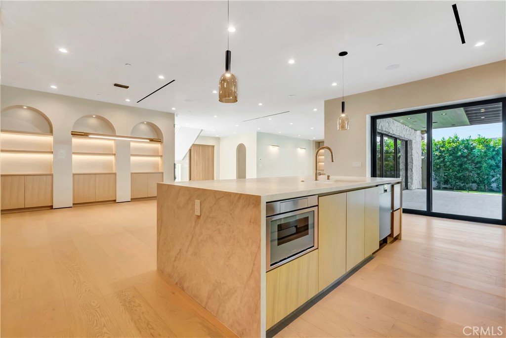 5149 Beeman Avenue Valley Village, CA 91607 - Photo 11 of 21 a kitchen with stainless steel appliances granite countertop a stove and a sink