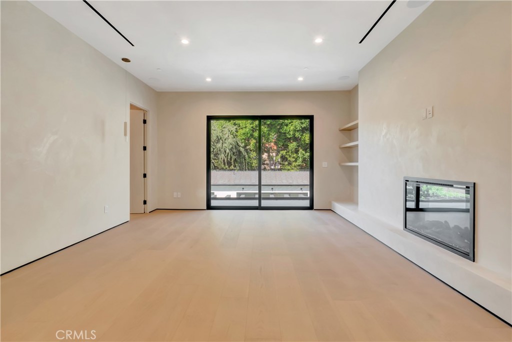 5149 Beeman Avenue Valley Village, CA 91607 - Photo 16 of 21 an empty room with windows & cabinet