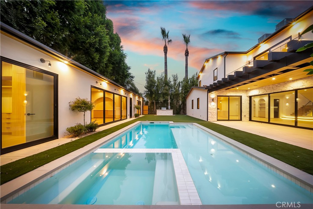 5149 Beeman Avenue Valley Village, CA 91607 - Photo 19 of 21 a view of swimming pool with a patio and a yard