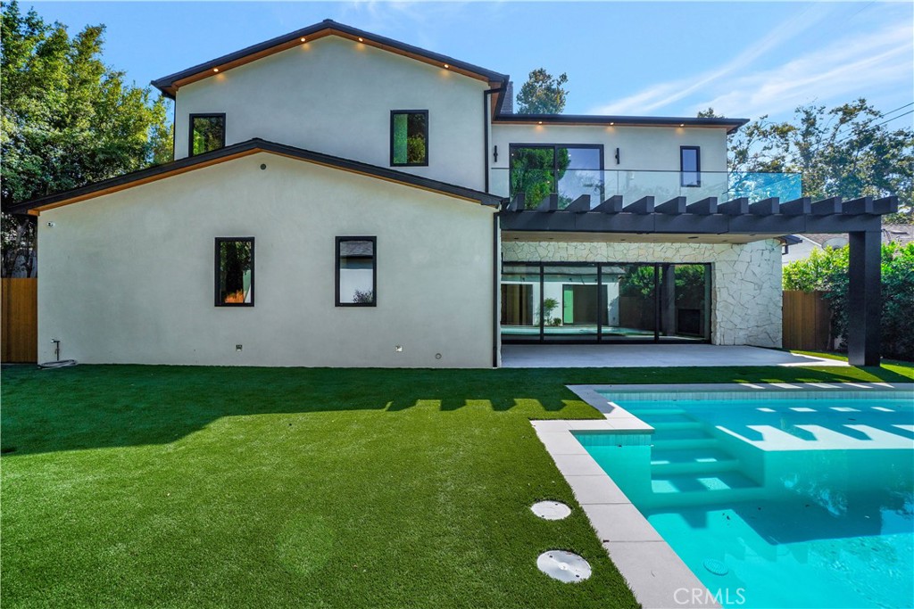 5149 Beeman Avenue Valley Village, CA 91607 - Photo 20 of 21 a view of a house with a yard