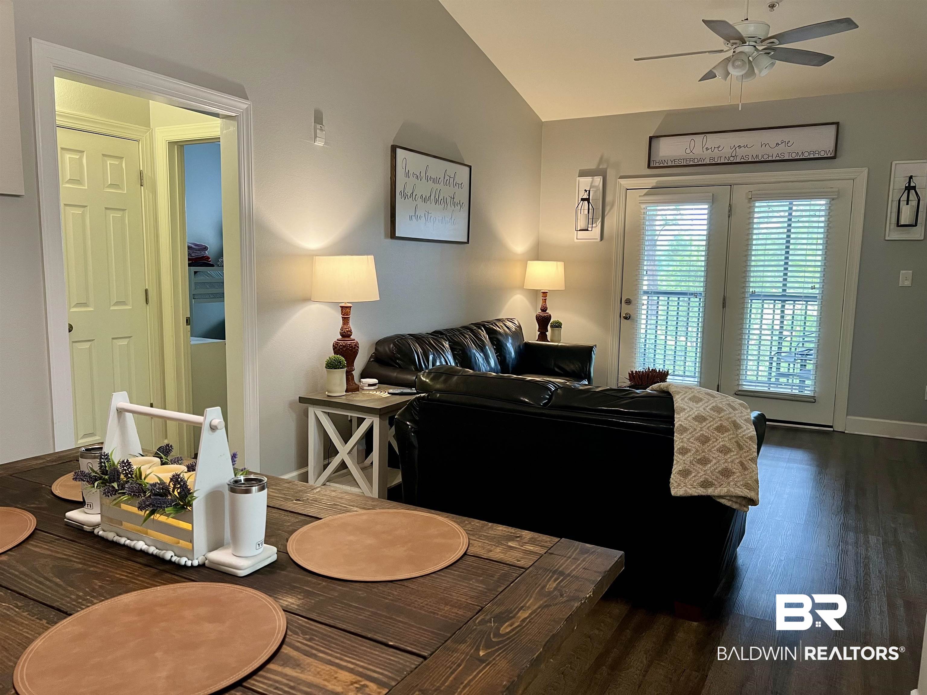 450 Park Avenue, Unit 808 Foley, AL 36535 - Photo 4 of 38 Living room featuring ceiling fan, dark hardwood / wood-style flooring, and vaulted ceiling