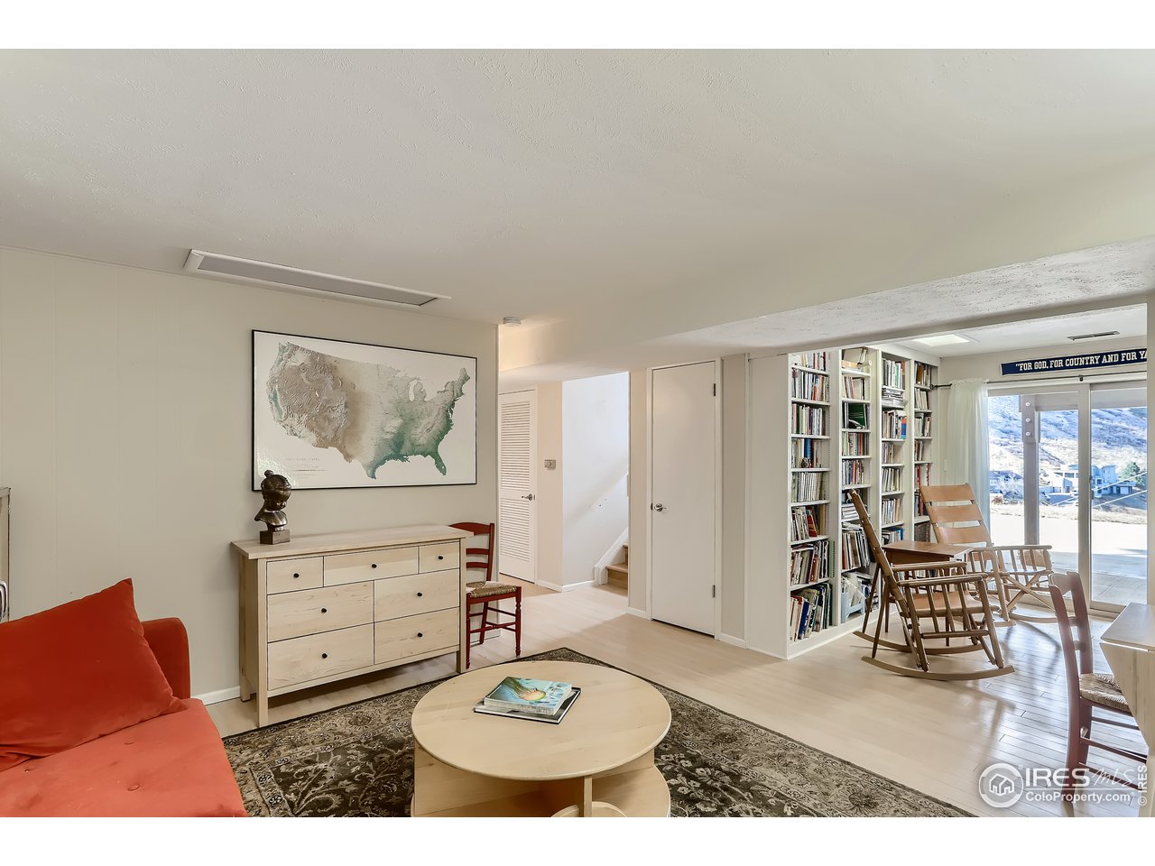 389 South Cedar Brook Road Boulder, CO 80304 - Photo 20 of 30 a living room with furniture and wooden floor