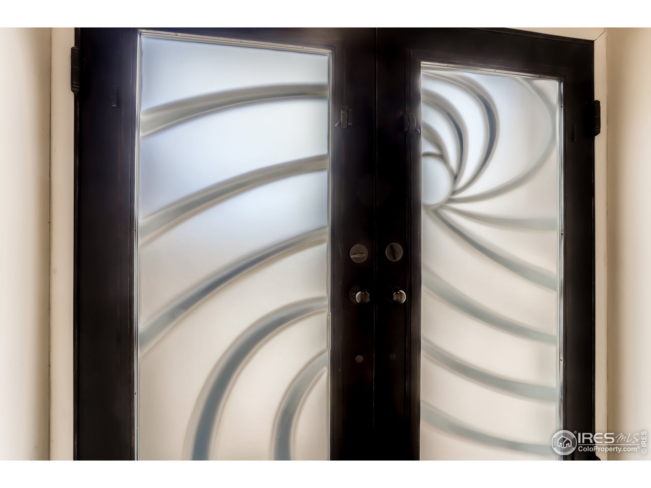 389 South Cedar Brook Road Boulder, CO 80304 - Photo 21 of 30 a view of a living room with wooden floor