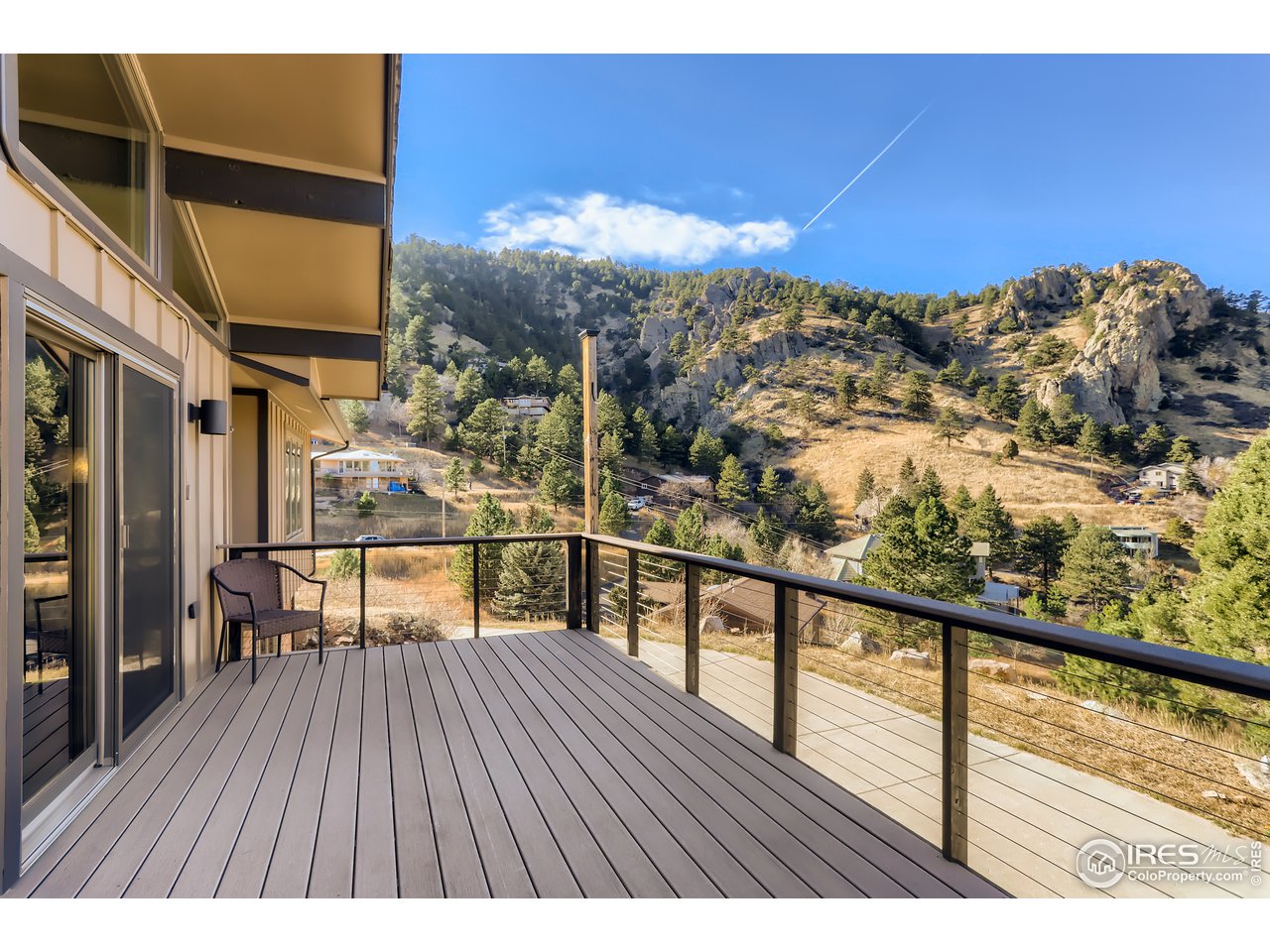 389 South Cedar Brook Road Boulder, CO 80304 - Photo 23 of 30 a view of a balcony with wooden floor