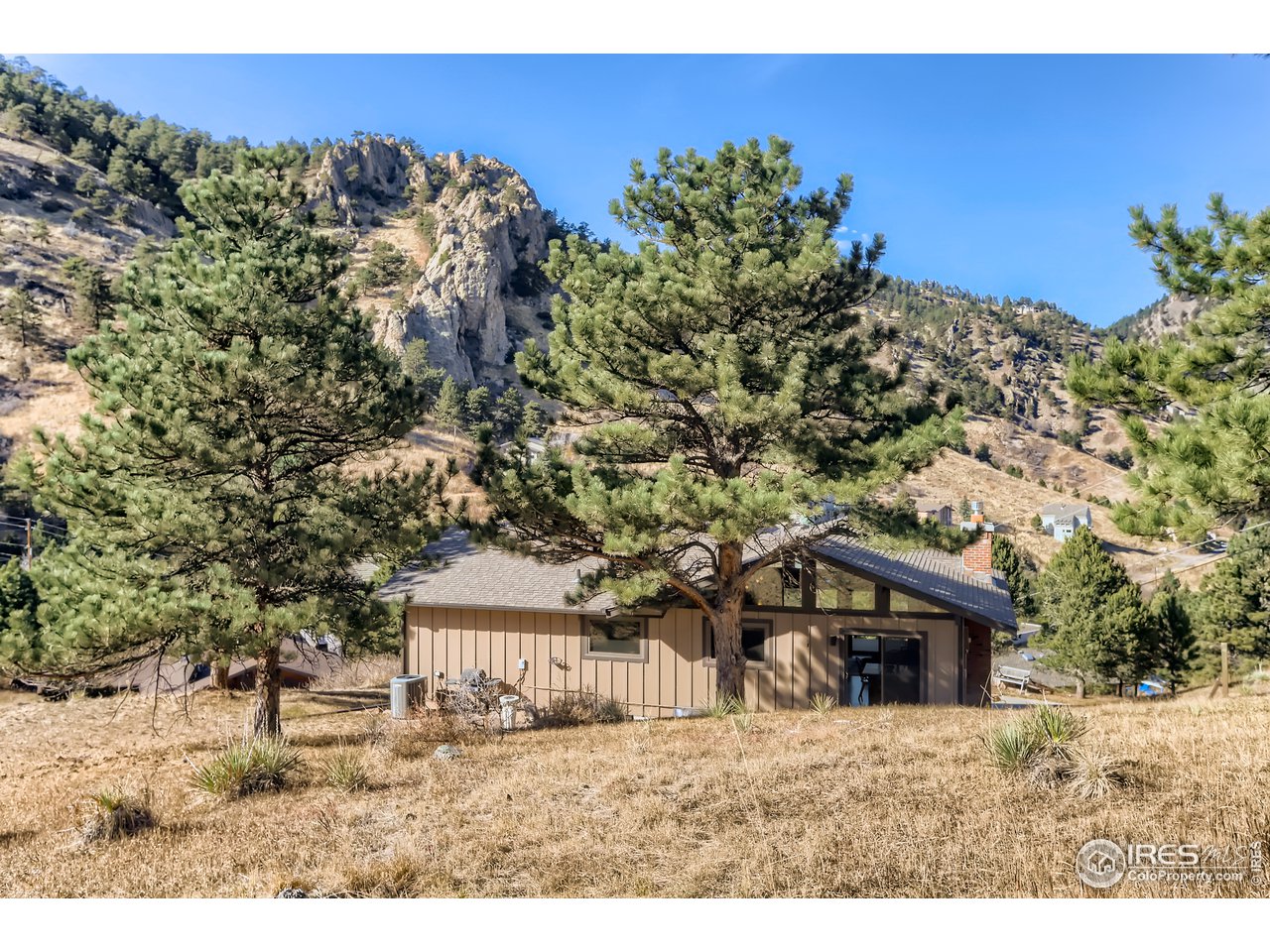 389 South Cedar Brook Road Boulder, CO 80304 - Photo 25 of 30 a view of a house with a yard
