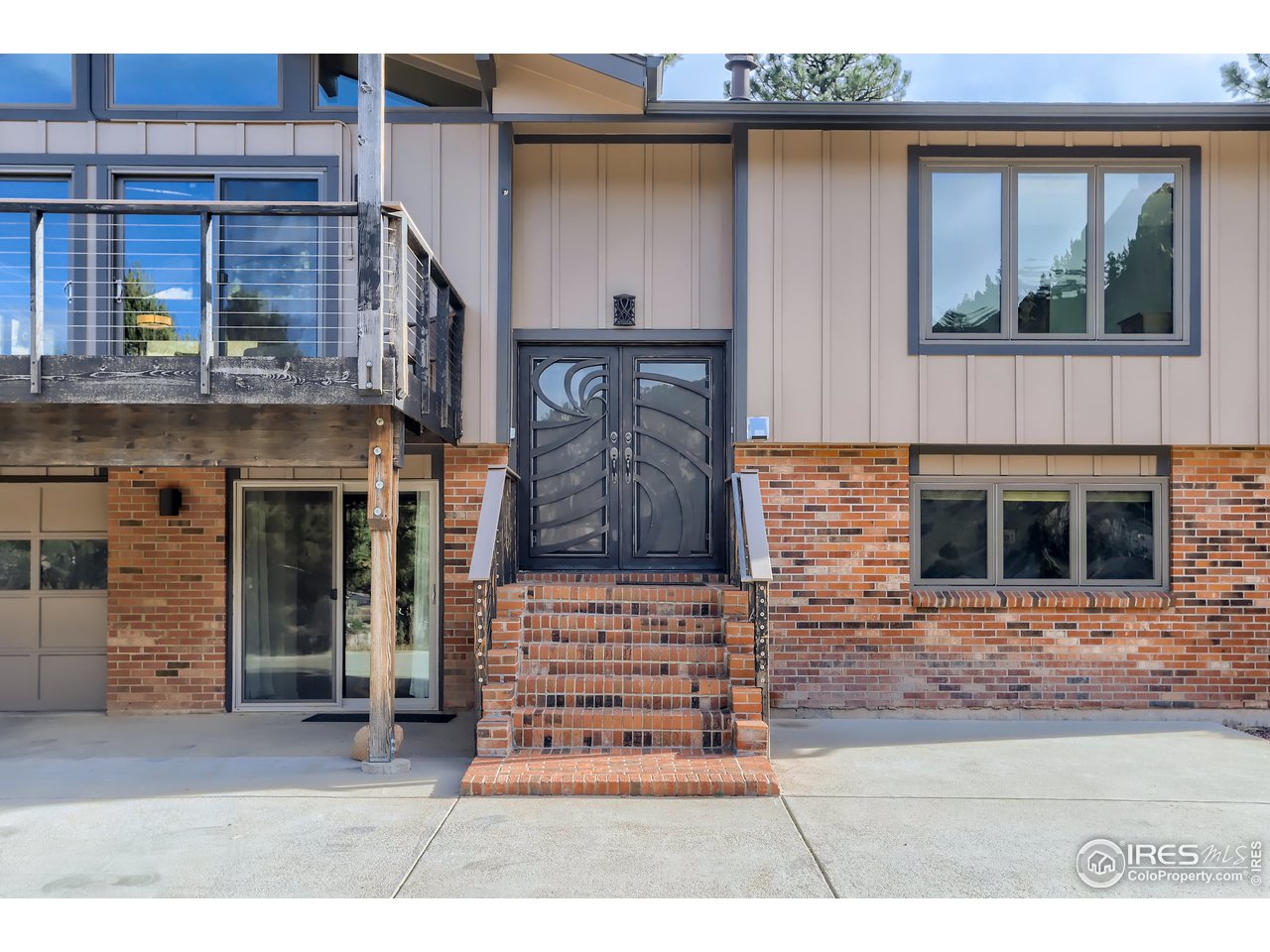 389 South Cedar Brook Road Boulder, CO 80304 - Photo 3 of 30 a black and white photo of a living room