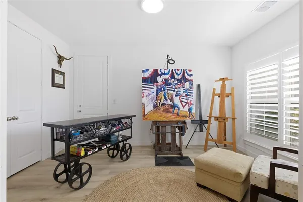 a view of game room with window and couch